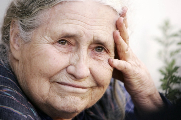 (FILES) In a file picture taken on October 11, 2007 British writer Doris Lessing holds her head in her hands outside her home in north London, as she is told by photographers that she has won the Nobel Literature Prize, after returning from a shopping trip. The Nobel Prize-winning British author Doris Lessing died on November 17, 2013 at the age of 94, her agent said.  AFP PHOTO / SHAUN CURRYSHAUN CURRY/AFP/Getty Images
